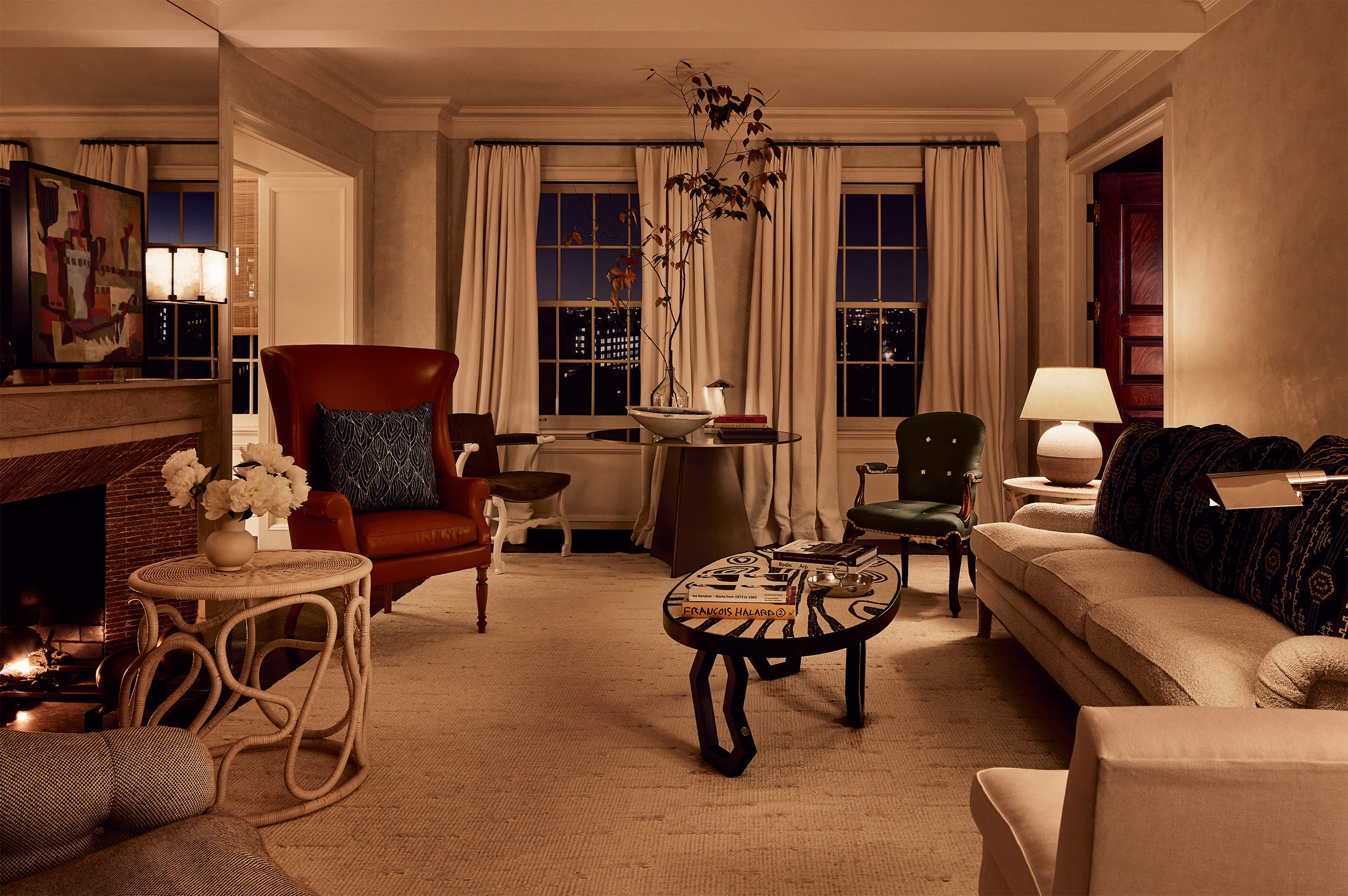 Cozy living room with a mix of modern and classic furniture.