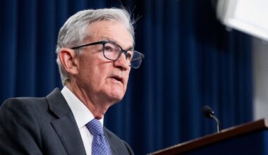 Divided Fed cuts interest rates, amid job market concerns