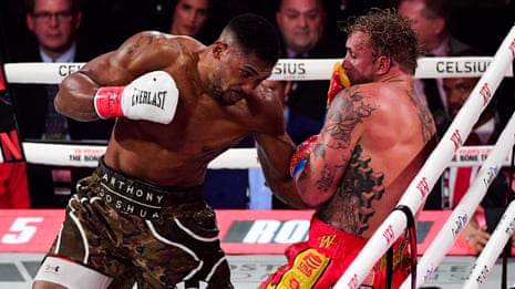 Anthony Joshua calls out Tyson Fury after knockout victory over Jake Paul – video 