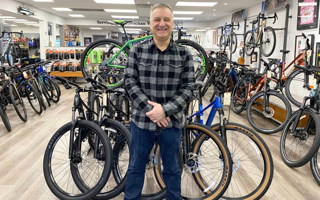 Experience Cycling owner Will Arnold, known for his community rides and community pride, believes in supporting local and giving back to the community. (Chadd Cawson/Citizen)