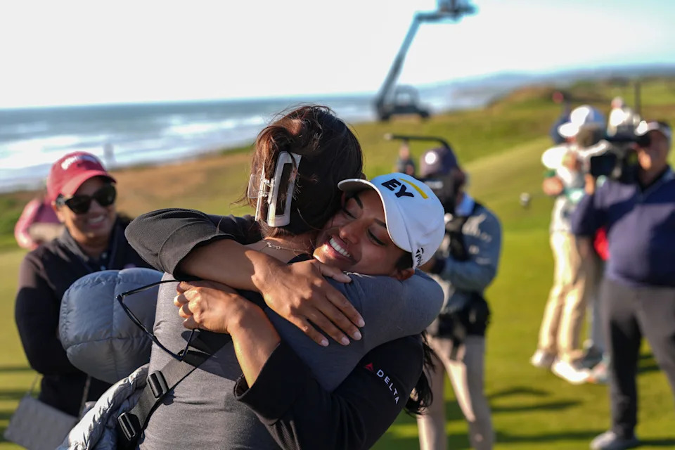 Megha Ganne gets a hug after winning the 2025 U.S. Women's Amateur at Bandon Dunes Golf Resort in Bandon, Ore. on Sunday, Aug. 10, 2025.