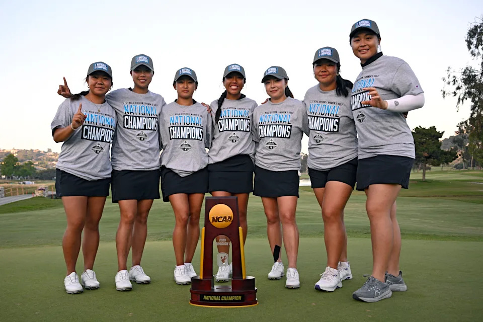 Northwestern University players pose with the winners trophy after the match play finals in the NCAA Division I Women's Golf Championships at Omni La Costa Resort & Spa on May 21, 2025 in Carlsbad, California.