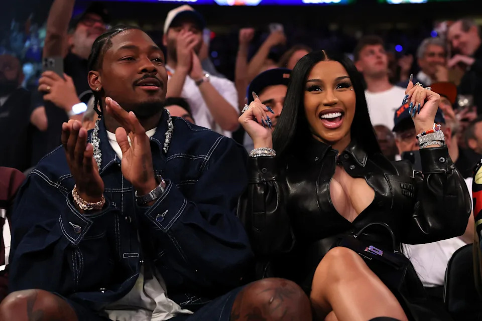 Cardi B, right, and boyfriend Stefon Diggs sit courtside during an NBA match between the Boston Celtics and the New York Knicks at Madison Square Garden in New York City on May 12, 2025.