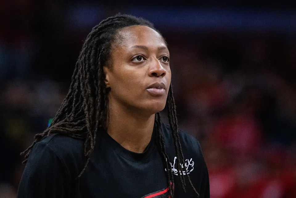 Indiana Fever guard Kelsey Mitchell looks on before Game 3 of the WNBA semifinals against the Las Vegas Aces.© Trevor Ruszkowski-Imagn Images