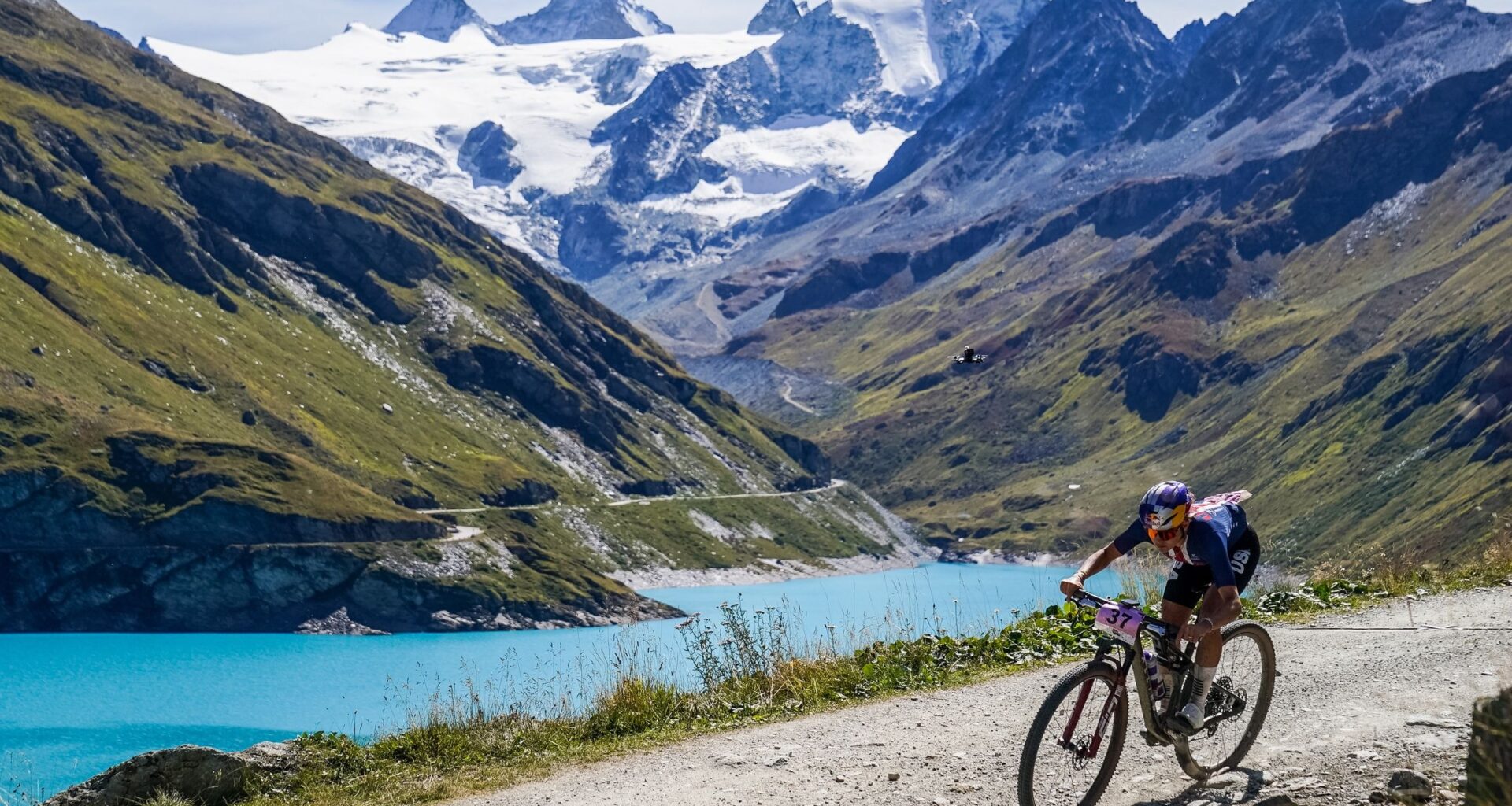Kate Courtney descends on flat tyre in Swiss Alps to win 2025 UCI MTB Cross-country Marathon World Championship
