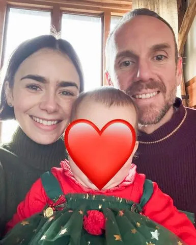 Lily Collins/Instagram Collins, McDowell and daughter Tove.