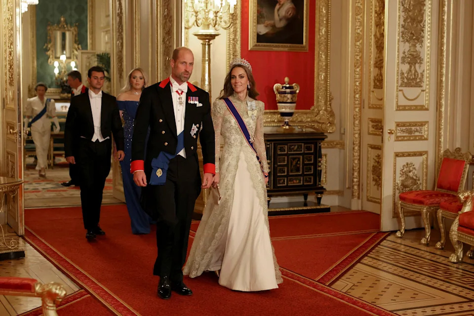 Britain's Kate and Prince William arrive for a State Banquet at Windsor Castle, in Windsor, England, Sept. 17, 2025. (Phil Noble/Pool Photo via AP)