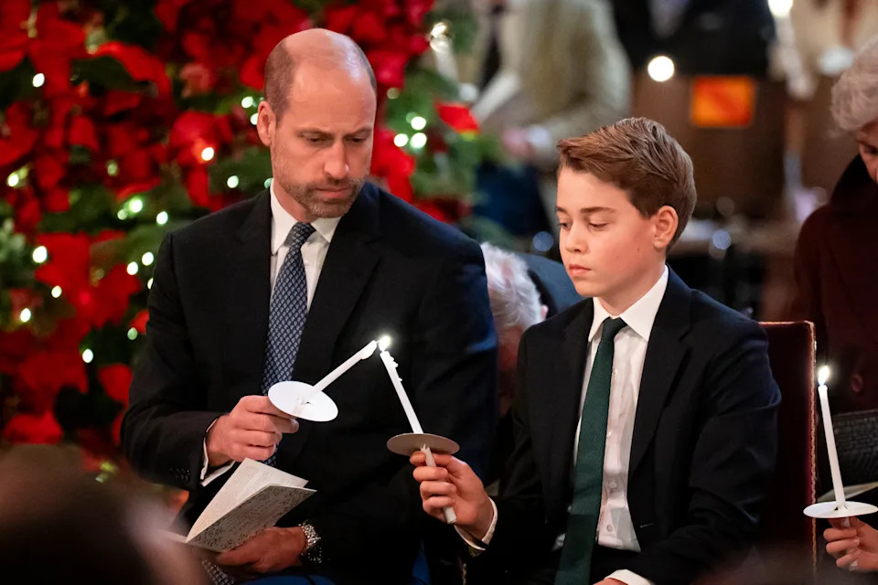 Britain's Prince William, left, and Prince George attend the Together At Christmas carol service at Westminster Abbey in London, Friday Dec. 5, 2025. (Aaron Chown/PA via AP, Pool)