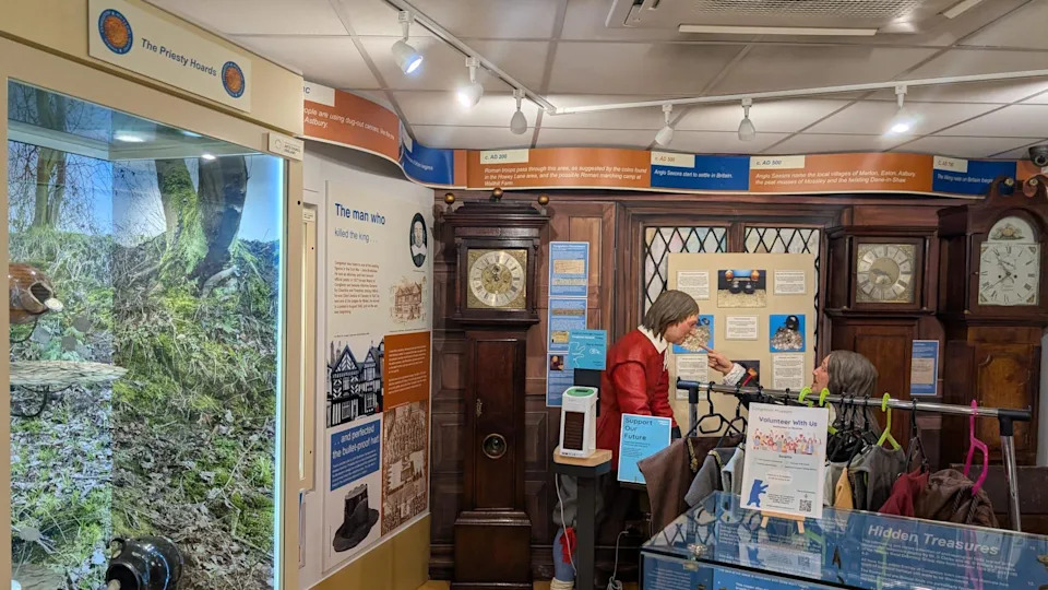 A view inside Congleton Museum. It shows the Priestly coin hoards on the left and a display about the Congleton links to the regicide of King Charles I.