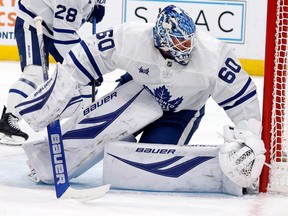 Toronto Maple Leafs goaltender Joseph Woll watches the puck.