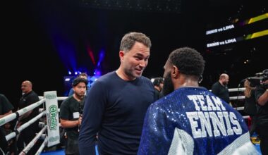 Jaron “Boots” Ennis speaks with promoter Eddie Hearn inside the ring after scoring a first-round knockout of Uisma Lima at the Wells Fargo Center in Philadelphia on October 11, 2025.
