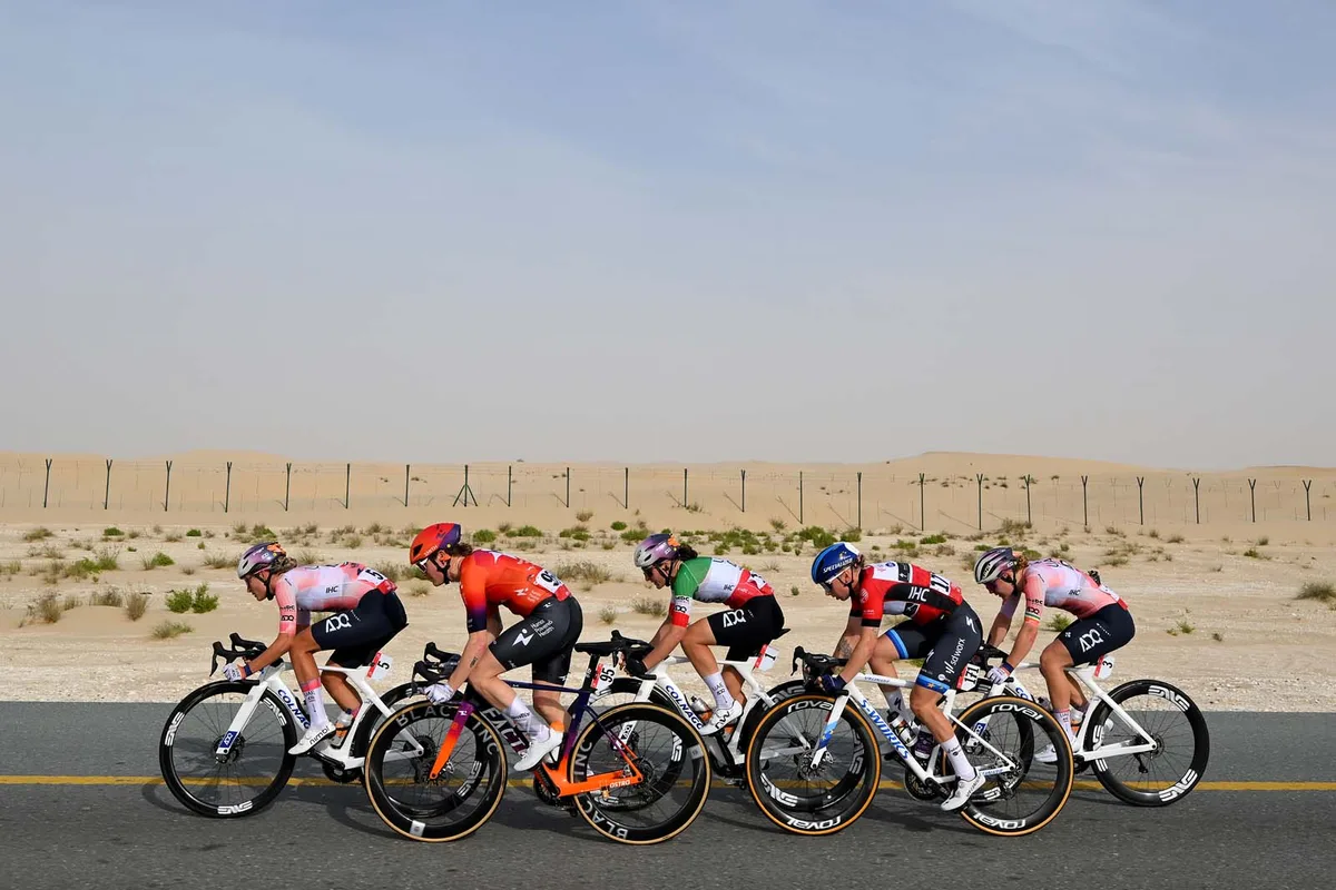 A general view of Lily Williams of United States and Team Human Powered Health, Lara Gillespie of Ireland and UAE Team ADQ, Elisa Longo Borghini of Italy and UAE Team ADQ, Lorena Wiebes of Netherlands and Team SD Worx - Protime - Red Leader Jersey and Karlijn Swinkels of Netherlands and UAE Team ADQ compete in the breakaway during the 3rd UAE Tour Women, Stage 2.