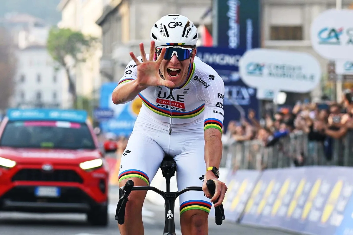 Tadej Pogacar of Slovenia and Team UAE Team Emirates celebrates at finish line as race winner during the 119th Il Lombardia 2025.