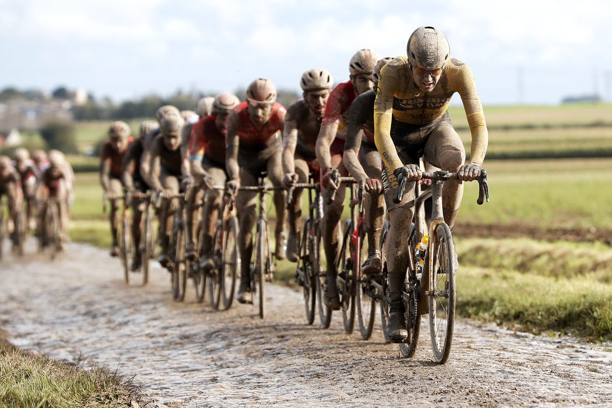 ROUBAIX, FRANCE - OCTOBER 03: Nathan Van Hooydonck of Belgium and Team Jumbo - Visma leads the peloton during the 118th Paris-Roubaix 2021 - Men