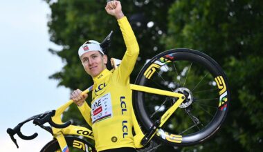 TOPSHOT - UAE Team Emirates - XRG team's Slovenian rider Tadej Pogacar celebrates on the podium with the overall leader's yellow jersey after the 21st and final stage of the 112th edition of the Tour de France cycling race, 132.3 km between Mantes-la-Ville and Paris Champs-&Eacute;lysees, on July 27, 2025. (Photo by Marco BERTORELLO / AFP) (Photo by MARCO BERTORELLO/AFP via Getty Images)