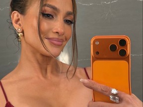 Jennifer Lopez was roasted by fans after her Christmas selfie appeared to have been altered.
