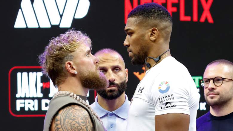 Jake Paul and Anthony Joshua face off during a press conference for Jake Paul v Anthony Joshua at Kaseya Center on November 21, 2025 in Miami, Florida