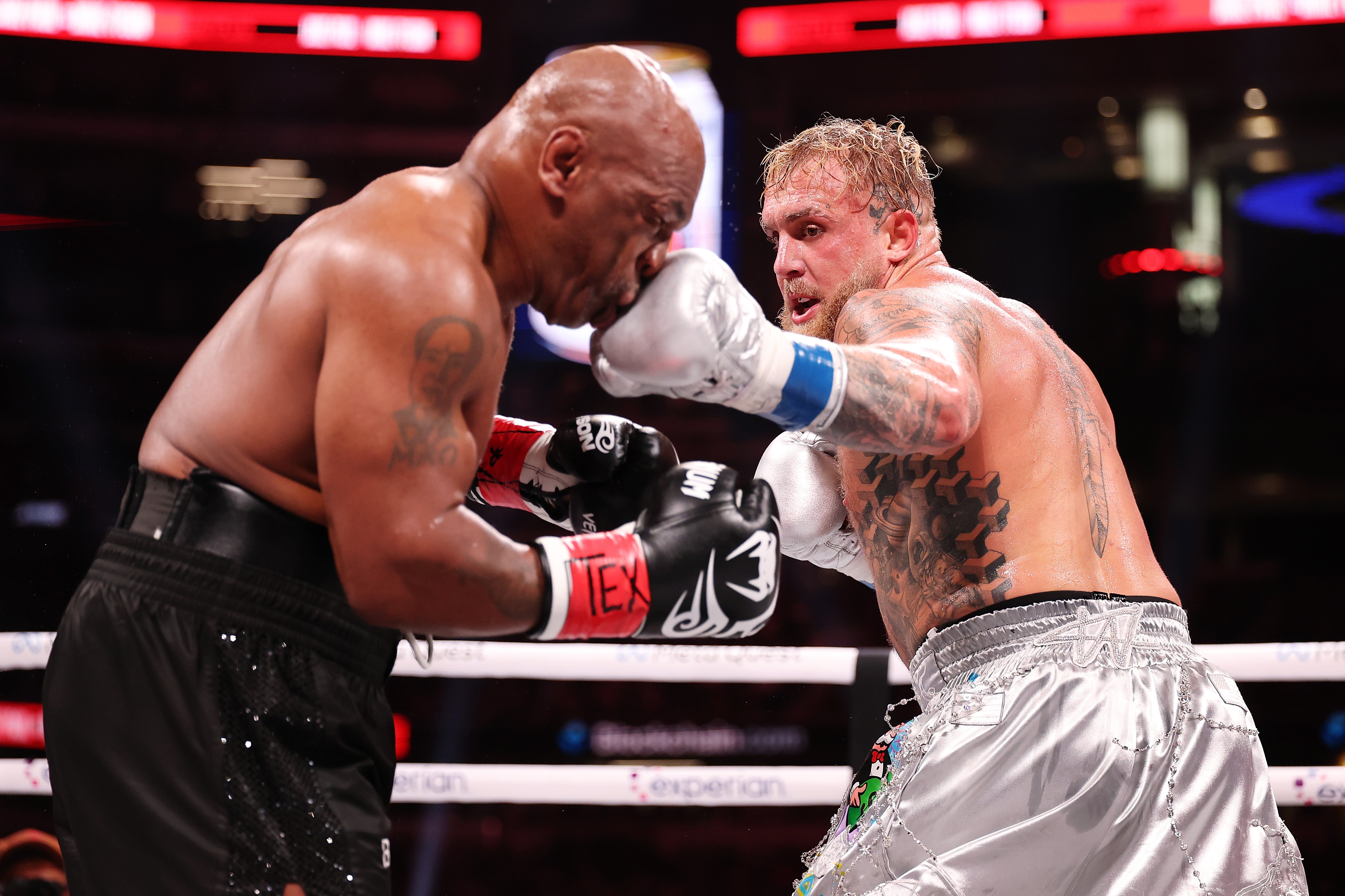 Jake Paul (right) in his highly-controversial fight with Mike Tyson