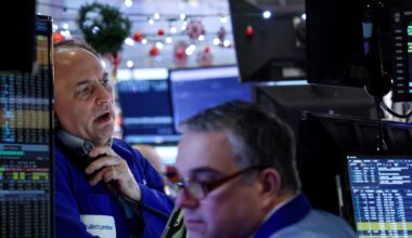 S&P 500, Nasdaq end slightly down in holiday-thin trade, Meta gains on deal