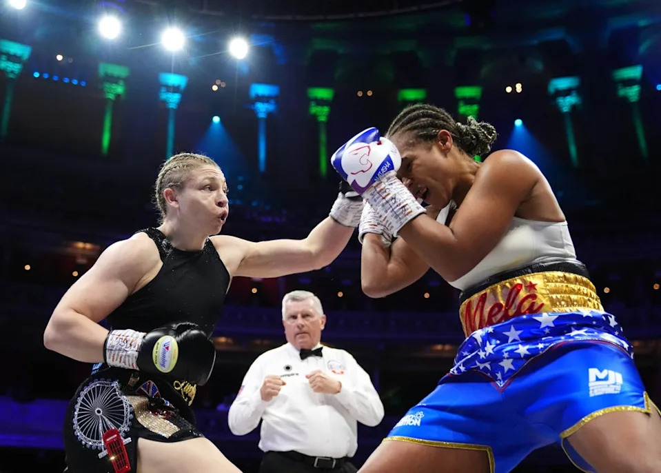 Lauren Price (left) took the women’s torch and welterweight world titles from Natasha Jonas (PA Wire)