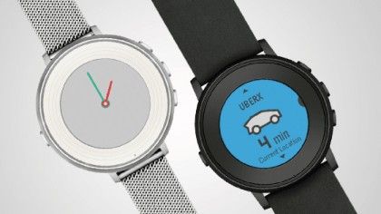 The Pebble Time Round smartwatch against a white background.