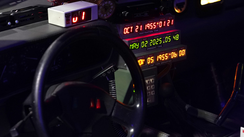 inside view of a delorean with time travel readout
