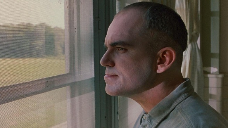 Karl Childers looking out window in Sling Blade