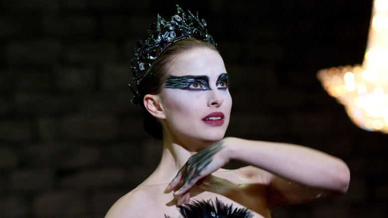 Natalie Portman as Nina Sayers, dancing in costume in Black Swan