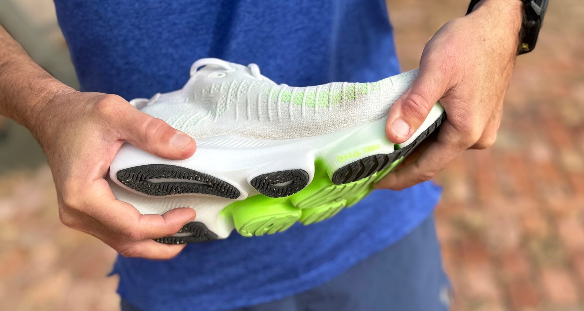 Brooks Glycerin Flex being flexed by a runner's hands