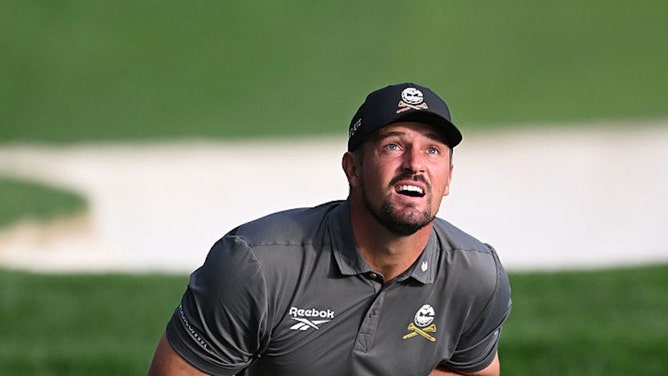 Bryson DeChambeau watching a shot at the PGA Championship