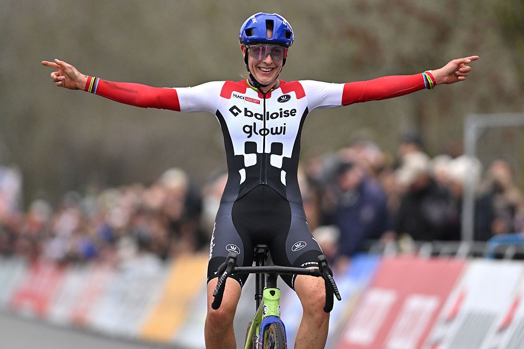 KOKSIJDE, BELGIUM - DECEMBER 21: Lucinda Brand of Netherlands and Team Baloise Glowi Lions celebrates at finish line as race winner during the 19th UCI Cyclo-Cross World Cup Koksijde 2025 - Women's Elite on December 21, 2025 in Koksijde, Belgium. (Photo by Luc Claessen/Getty Images)