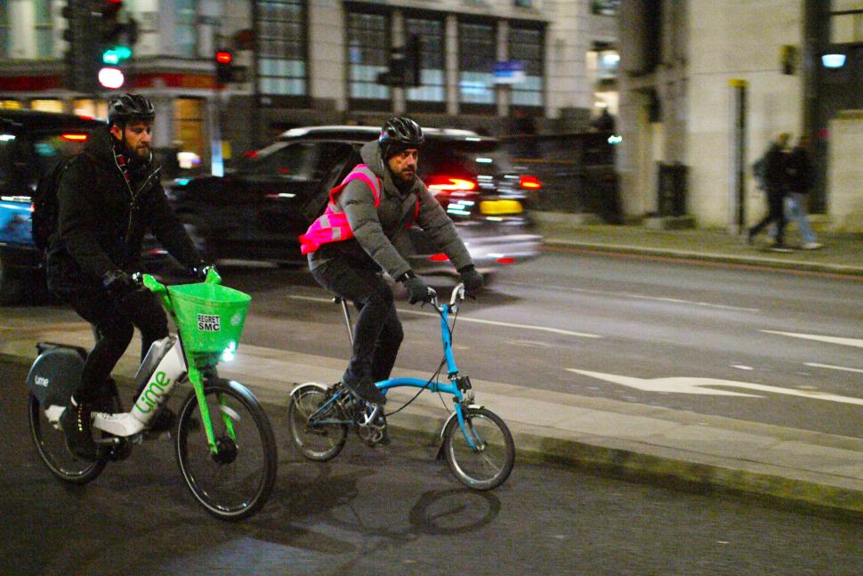 Cyclists in London Brompton and Lime hire bike
