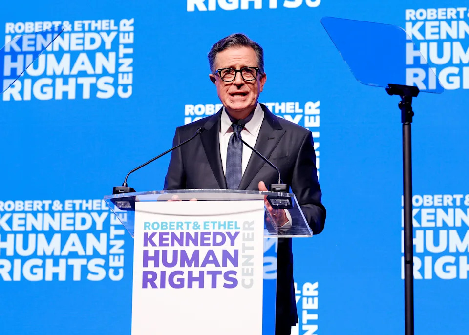 NEW YORK, NEW YORK - DECEMBER 09: Stephen Colbert speaks onstage during the Robert F. Kennedy Human Rights' 2025 Ripple of Hope Gala at New York Hilton on December 09, 2025 in New York City. (Photo by Kevin Mazur/Getty Images for RFK Ripple Of Hope)