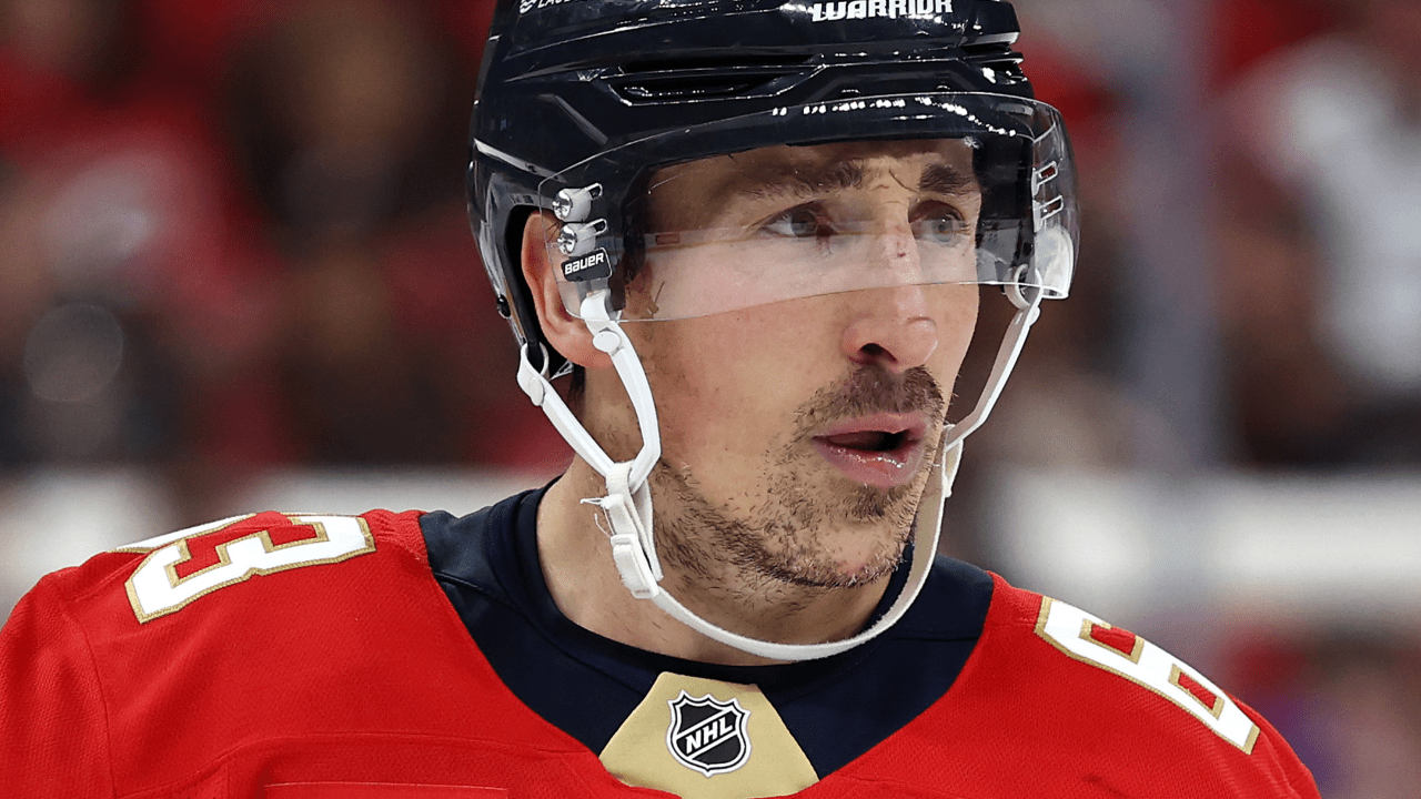 Marchand in unfamiliar spot on Olympic bubble