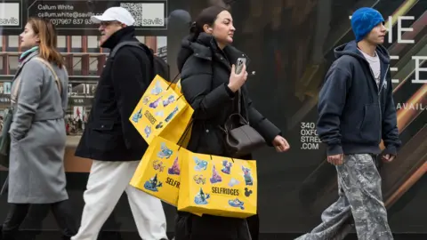 Getty Images Shoppers on Oxford Street, London, on Boxing Day 2025.