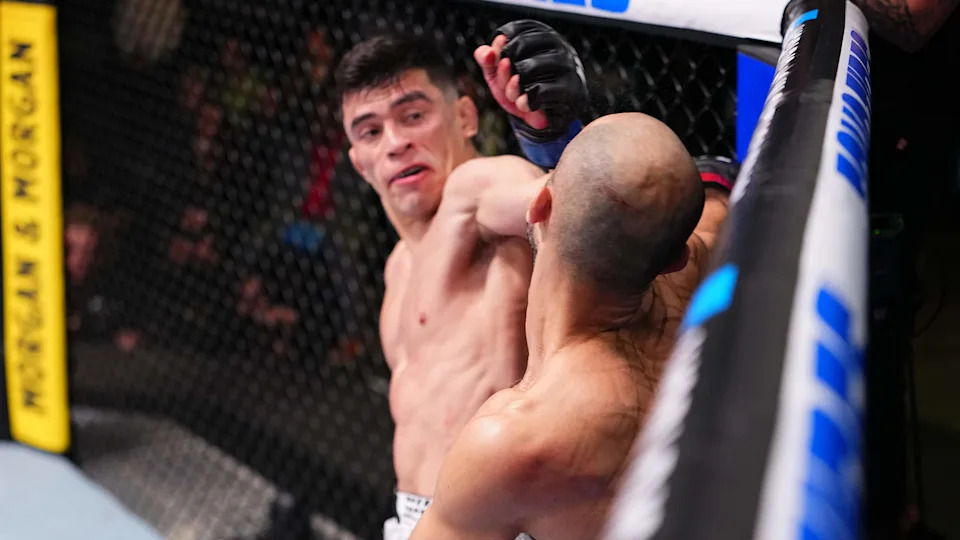 LAS VEGAS, NEVADA - DECEMBER 13: (L-R) Kevin Vallejos of Argentina knocks out Giga Chikadze of Georgia in a featherweight fight during the UFC Fight Night event at UFC APEX on December 13, 2025 in Las Vegas, Nevada.  (Photo by Jeff Bottari/Zuffa LLC)