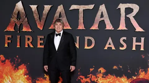 Getty Images Simon Franglen at the premiere of Avatar