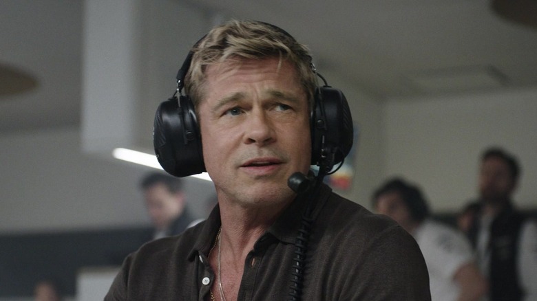 Sonny Hayes on headphones in F1