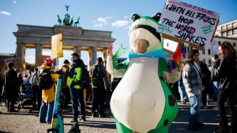 EPA A frog costume spotted in Berlin during the No Kings protests