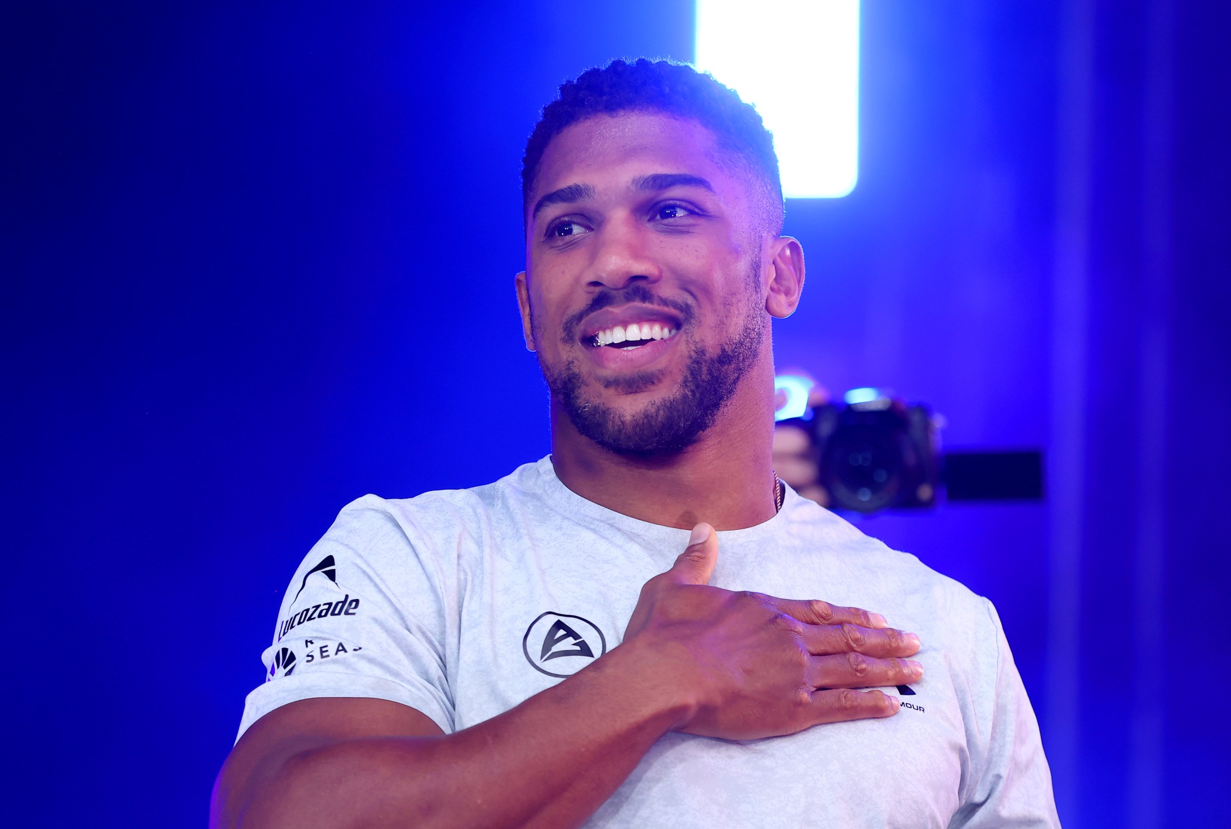 LONDON, ENGLAND - SEPTEMBER 20: Anthony Joshua gestures to the crowd during a weigh-in as part of the Riyadh Season - Wembley Edition card at Trafalgar Square on September 20, 2024 in London, England. (Photo by Richard Pelham/Getty Images)