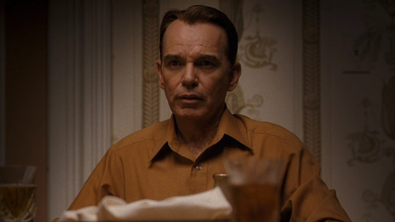 Skip Caldwell sitting at a table in Jayne Mansfield's Car