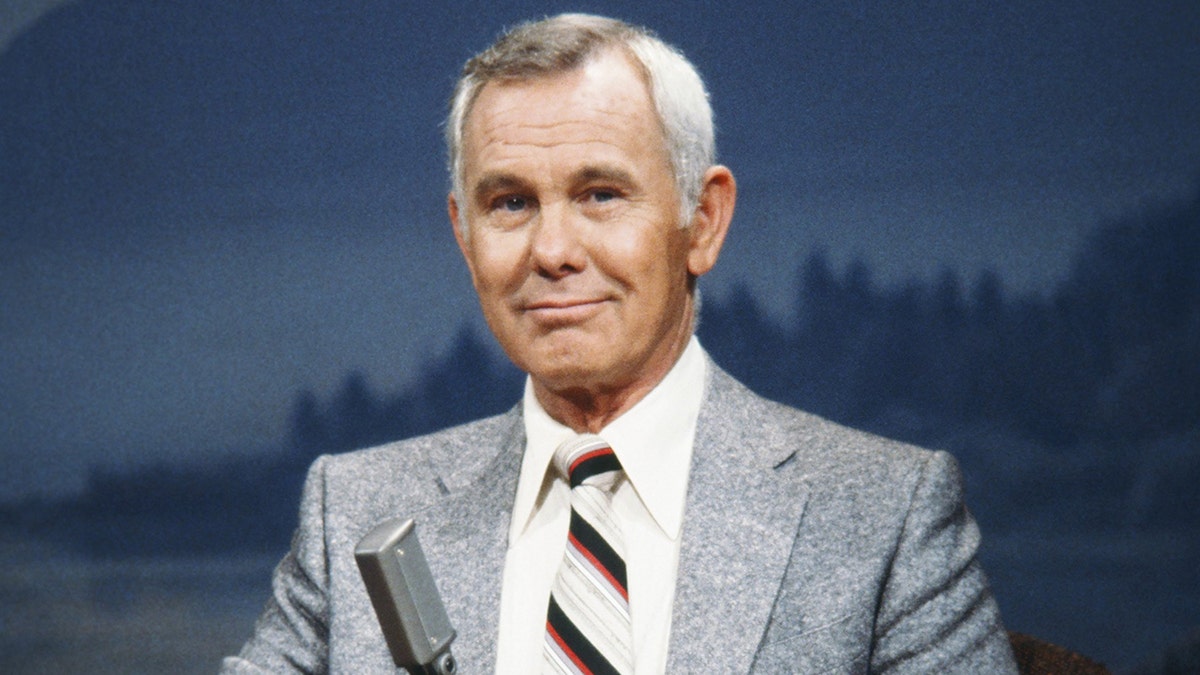 Johnny Carson behind the desk while filming "The Tonight Show"