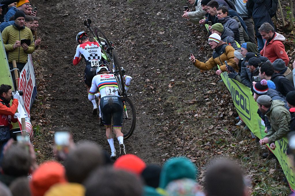 Belgian Thibau Nys and Dutch Mathieu Van Der Poel pictured in action during the men's elite race of the Cyclocross World Cup, in Namur, Sunday 14 December 2025, stage 4 (out of 12) in the World Cup of the 2026-2027 season.BELGA PHOTO DAVID PINTENS (Photo by DAVID PINTENS / BELGA MAG / Belga / AFP via Getty Images)
