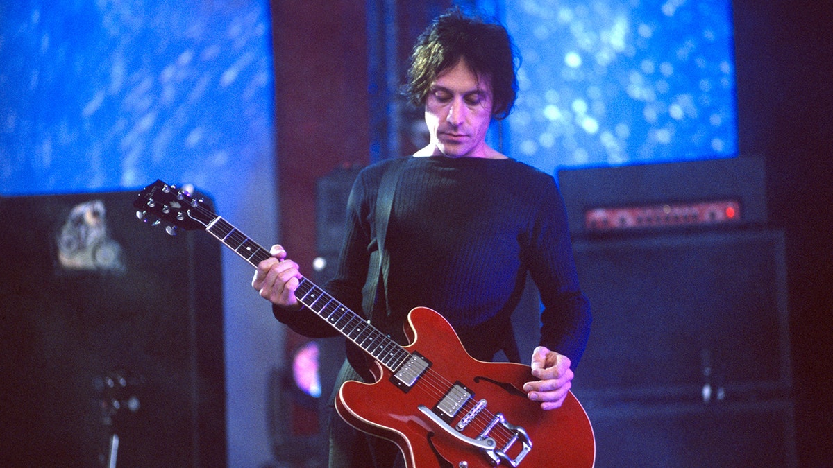 Perry Bamonte performing with The Cure in California in June 2000.