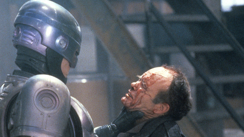 robocop throttling another man