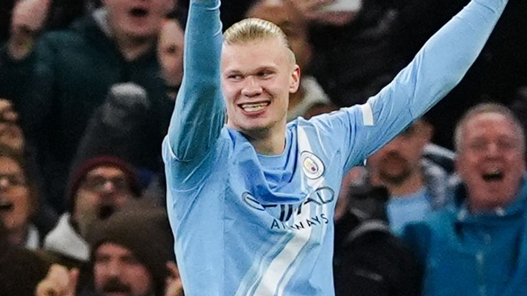 Erling Haaland celebrates scoring Man City's third goal