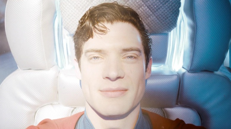 David Corenswet as Superman smiling while absorbing sunlight in Superman (2025)