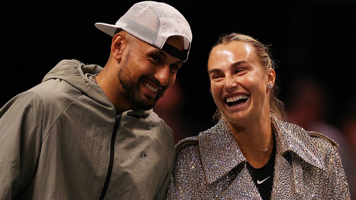 Aryna Sabalenka and Nick Kyrgios poses for a photo
