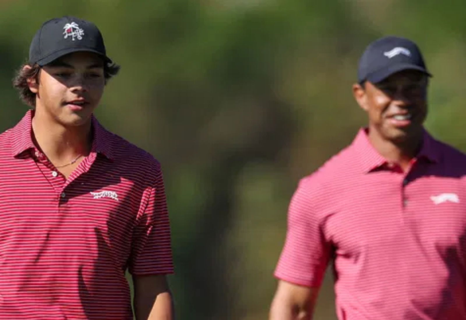 Charlie Woods with father Tiger Woods