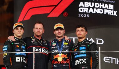 Race winner Max Verstappen of the Netherlands and Oracle Red Bull Racing Second placed Oscar Piastri of Australia and McLaren 2025 F1 World Drivers Champion and Third placed Lando Norris of Great Britain and McLaren and Richard Wolverson, Head of Racing Operations of Oracle Red Bull Racing on the podium during the F1 Grand Prix of Abu Dhabi at Yas Marina Circuit on December 07, 2025 in Abu Dhabi, United Arab Emirates. (Photo by Clive Rose/Getty Images) // Getty Images / Red Bull Content Pool //